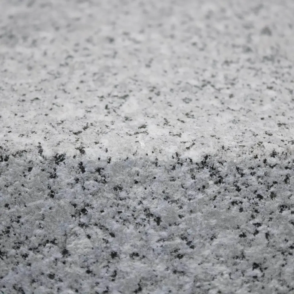 GRN01-Rasenkante-Granit-100x20x6-Textur.webp